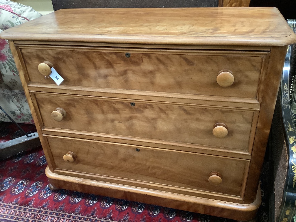 A Victorian satin birch three drawer chest, width 112cm depth 52cm height 90cm